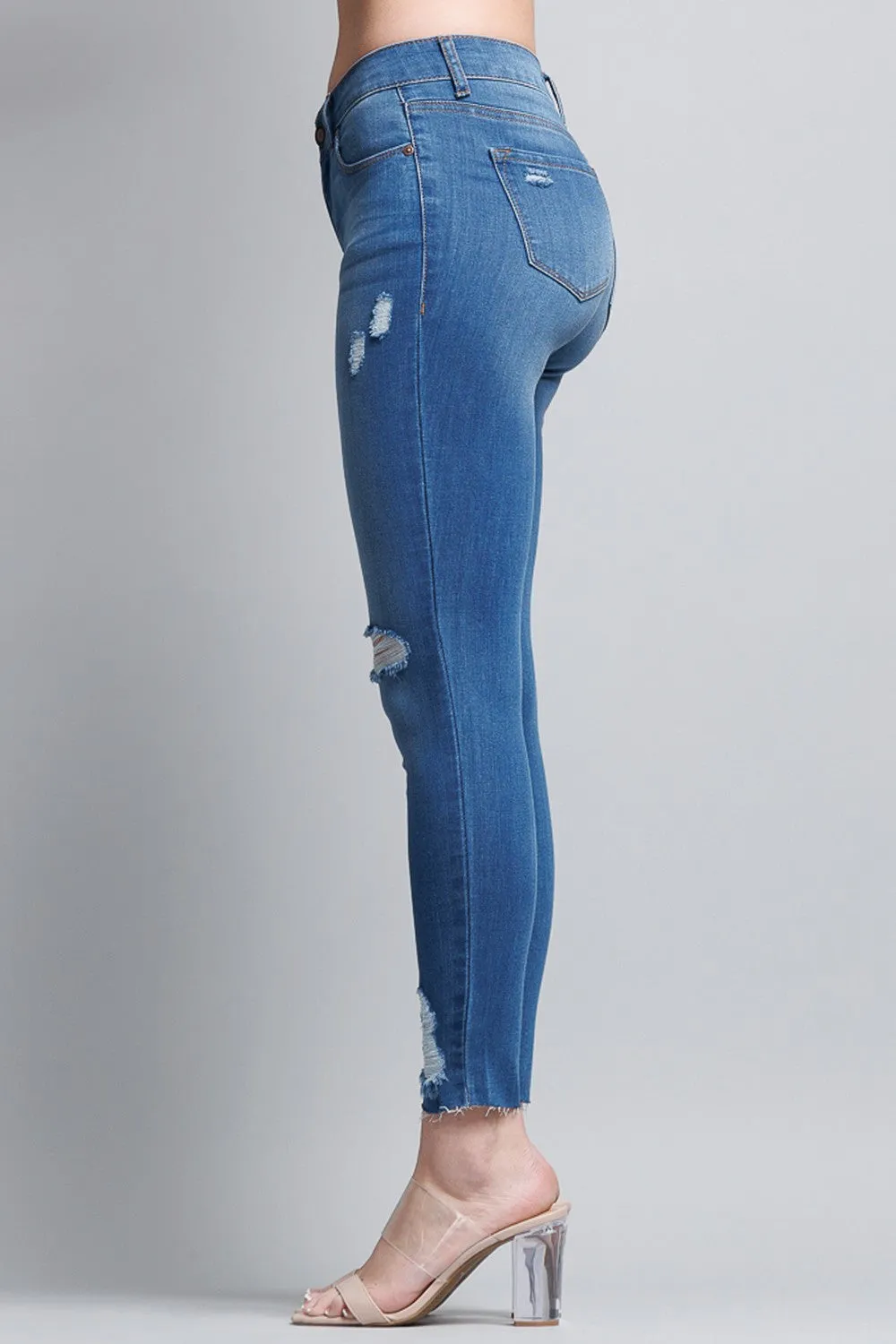 Distressed Mid Rise Skinny Jeans with Chewed Hems